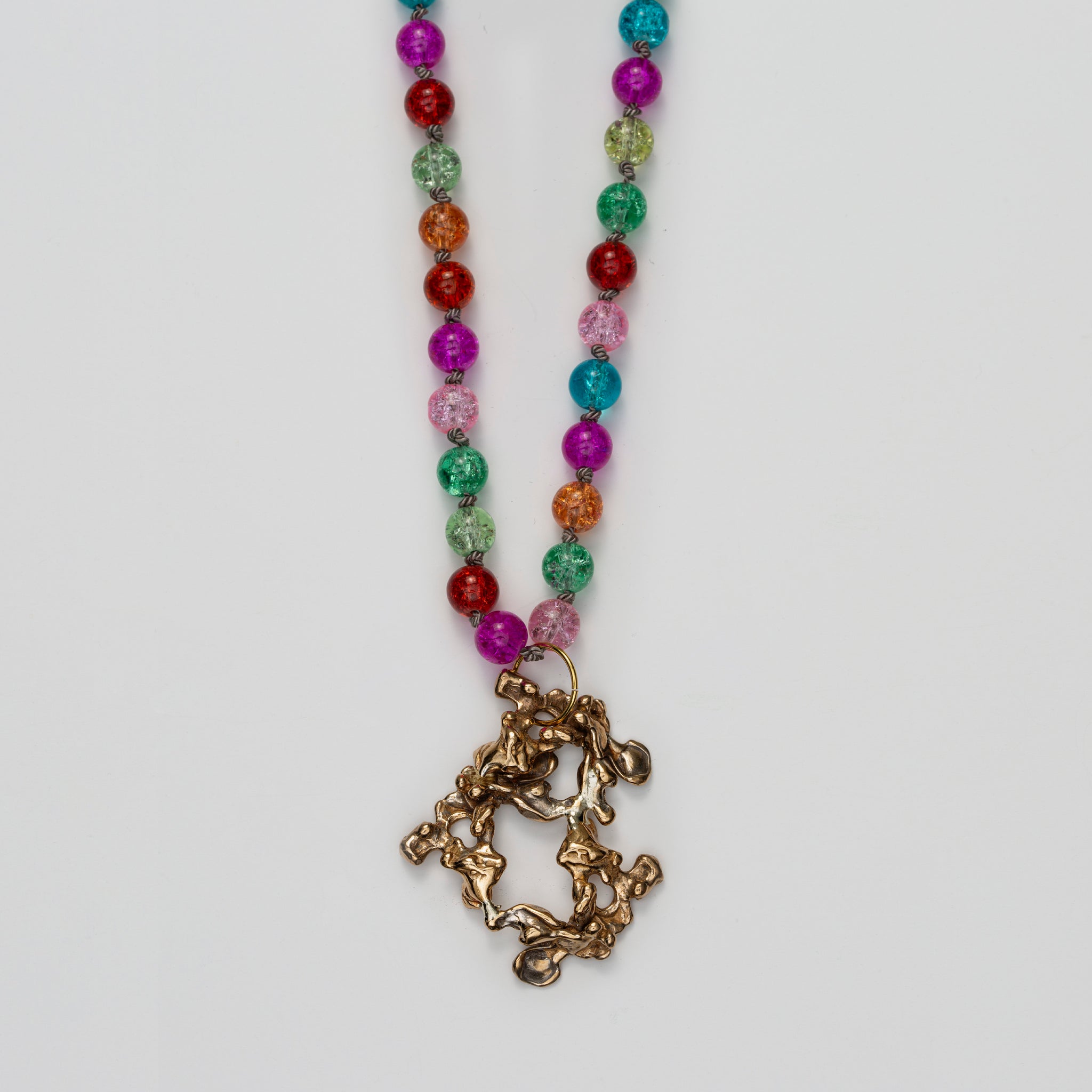 Necklace in Colored Glasspearl with Bronze Pendant